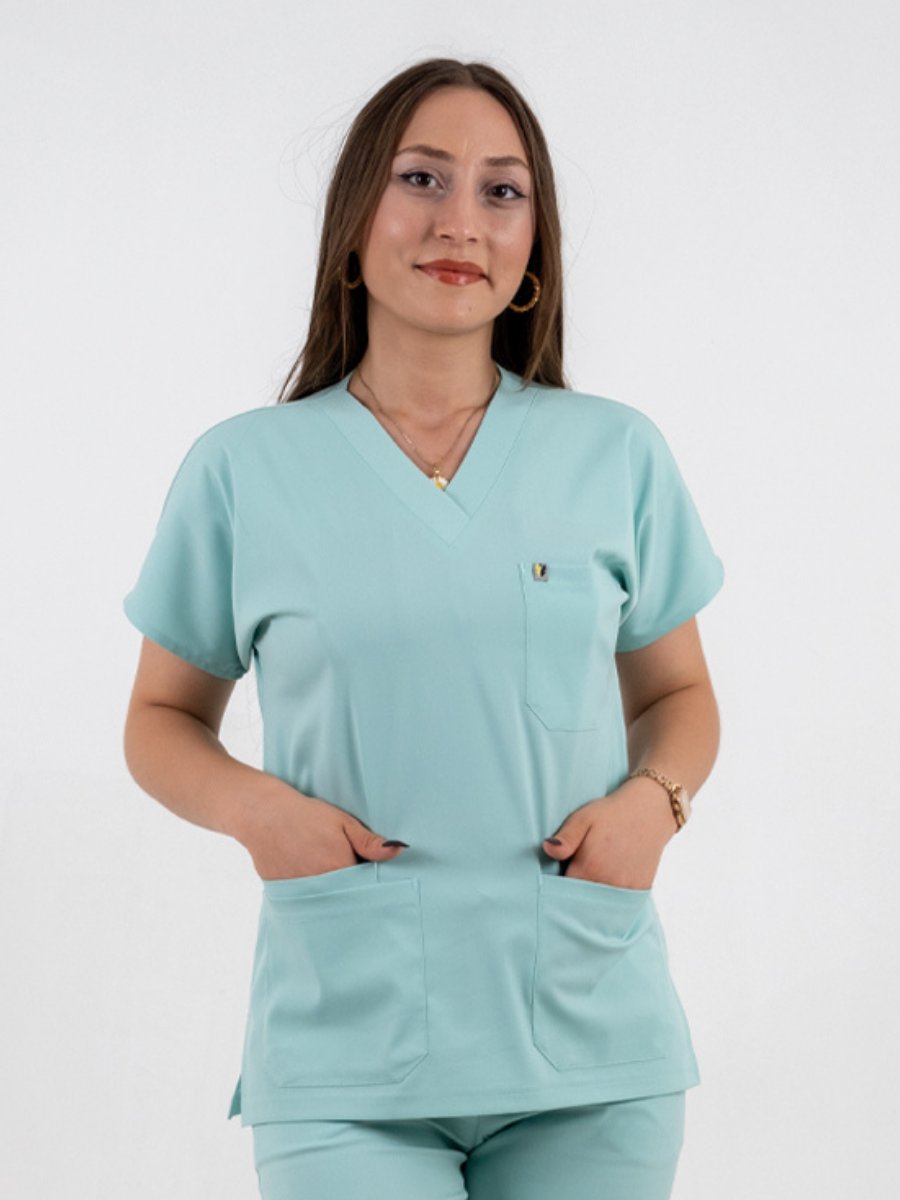 01KZE0NJAFJBE0QMVN81R5XG0Q.jpg Mint Mavisi Likralı Cerrahi Kol Tek Üst XS - Görsel 1